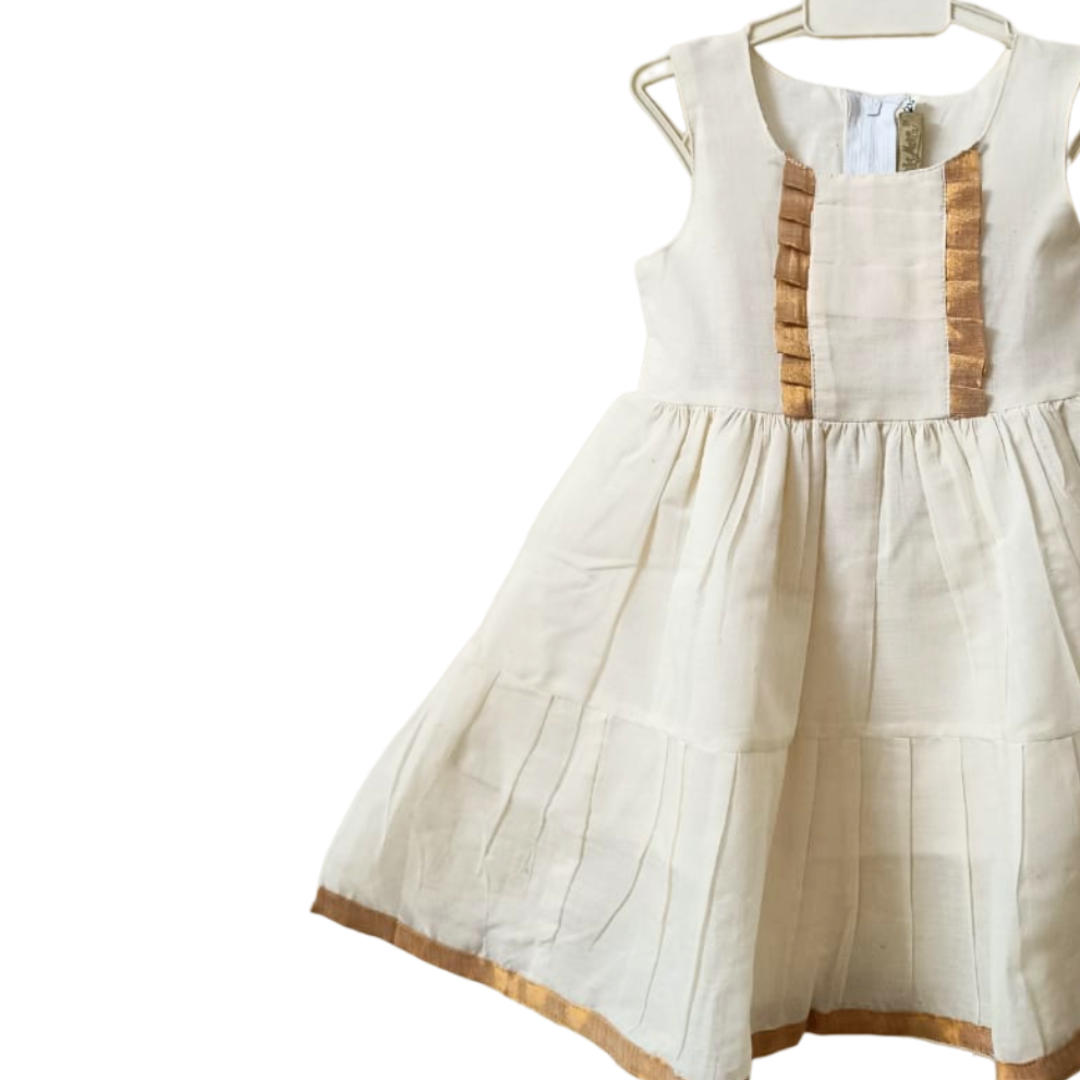 Simple step frock with gold detailing