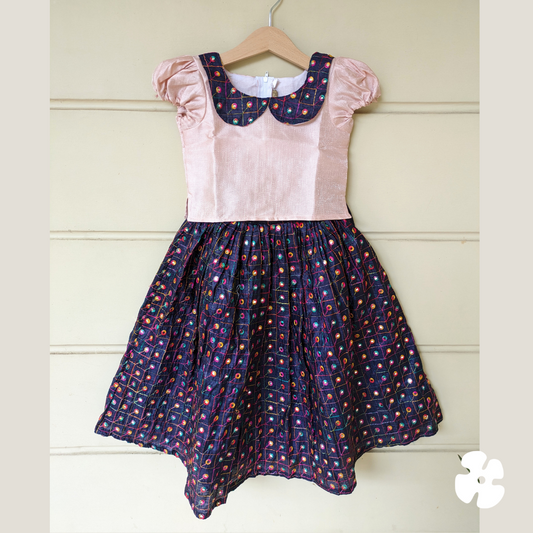 Top with collar and brocade skirt