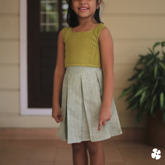 Pin tuck top with box pleat skirt